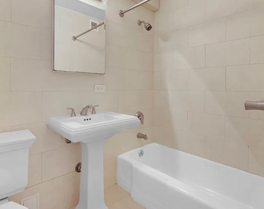 E 65th St - Photo Thumbnail 8