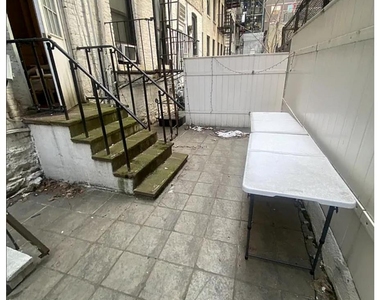 336 E 18th St - Photo Thumbnail 5