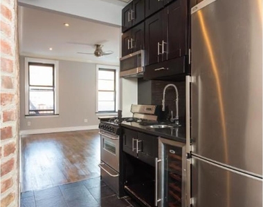 336 E 18th St - Photo Thumbnail 0