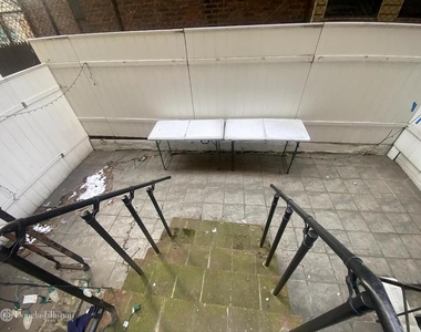 336 E 18th St - Photo Thumbnail 4