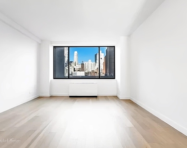 245 E 58th St - Photo Thumbnail 0