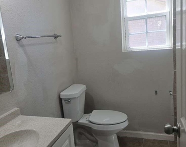 8607 Sherrywood Drive - Photo Thumbnail 4