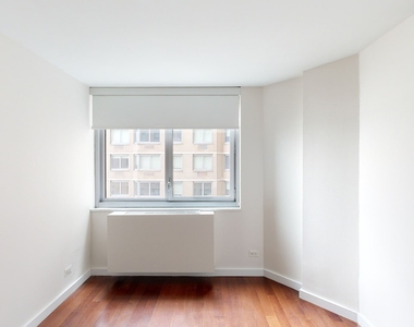 401 E 34th St - Photo Thumbnail 3