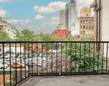 247 W 123rd Street - Photo Thumbnail 0
