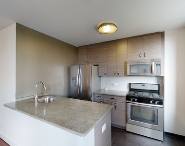 401 E 34th St - Photo Thumbnail 1