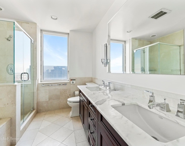 401 E 60th St - Photo Thumbnail 7
