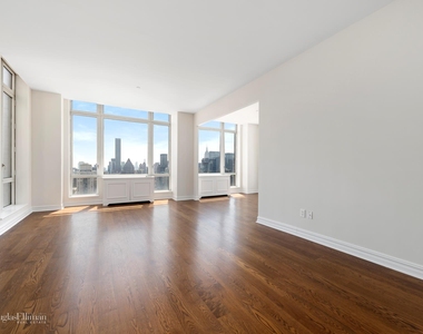 401 E 60th St - Photo Thumbnail 1
