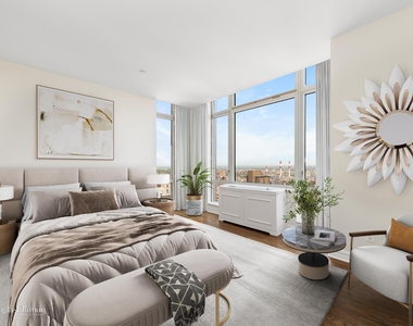 401 E 60th St - Photo Thumbnail 3