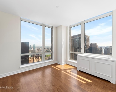 401 E 60th St - Photo Thumbnail 5