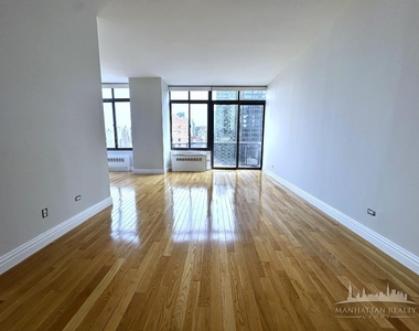 W 48th St - Photo Thumbnail 3