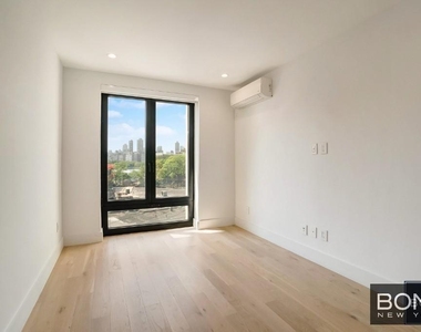 11-07 Welling Court - Photo Thumbnail 3