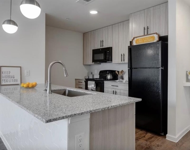 1200 W W Koenig Ln - Photo Thumbnail 16