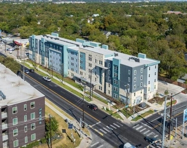 1200 W W Koenig Ln - Photo Thumbnail 4