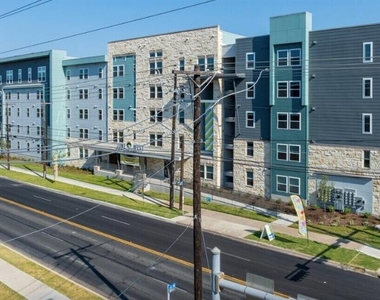 1200 W W Koenig Ln - Photo Thumbnail 1