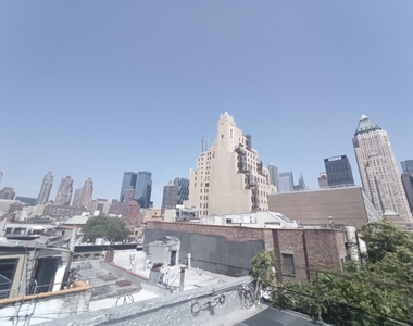 Corner of 10th Avenue And 51st Street - Photo Thumbnail 11