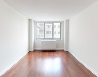 401 E 34th St - Photo Thumbnail 3