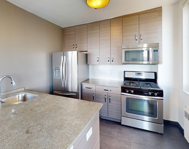 401 E 34th St - Photo Thumbnail 1