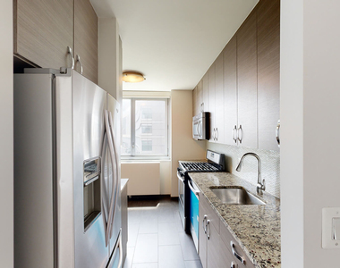 401 E 34th St - Photo Thumbnail 1