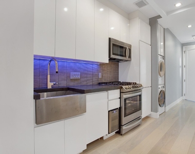 521 East 5th Street - Photo Thumbnail 0