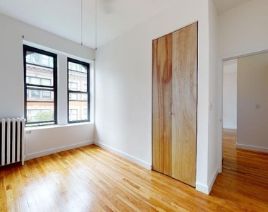 East 91 Street - Photo Thumbnail 3