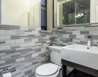 E 8th St. - Photo Thumbnail 6