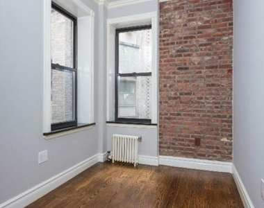 E 8th St. - Photo Thumbnail 2