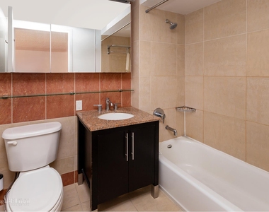 555 W 23rd St - Photo Thumbnail 6