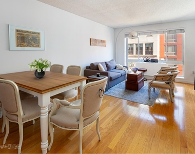 555 W 23rd St - Photo Thumbnail 0