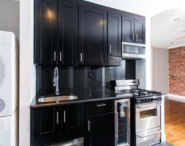 338 East 100th Street - Photo Thumbnail 3