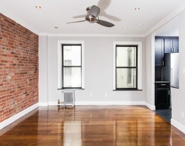 338 East 100th Street - Photo Thumbnail 2