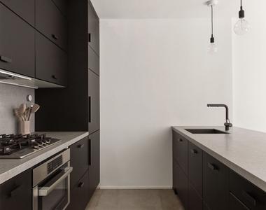 445 W 19th Street - Photo Thumbnail 4