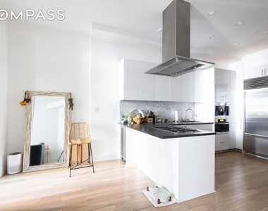 345 E 50th Street - Photo Thumbnail 0