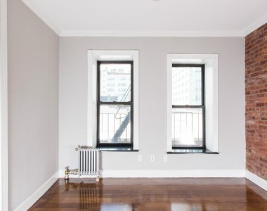 East 100th Street - Photo Thumbnail 3