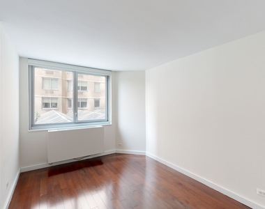 401 E 34th St - Photo Thumbnail 3