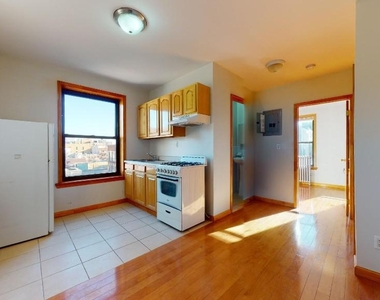 East 14th Street - Photo Thumbnail 2