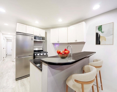338 W 17th St - Photo Thumbnail 2