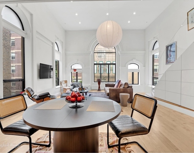 242 E 7th St - Photo Thumbnail 1