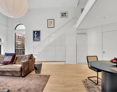242 E 7th St - Photo Thumbnail 2