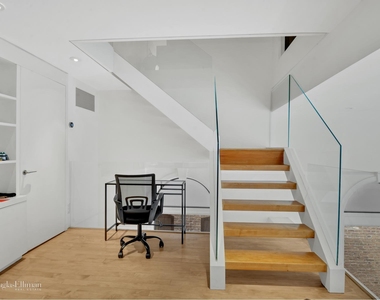 242 E 7th St - Photo Thumbnail 13