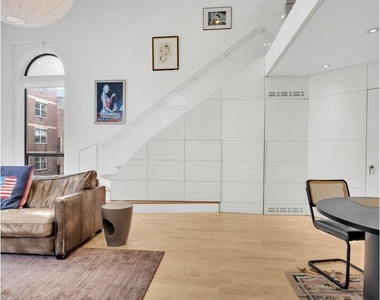 242 E 7th St - Photo Thumbnail 3