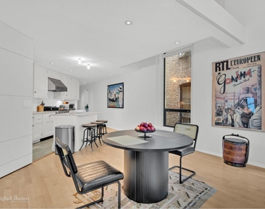 242 E 7th St - Photo Thumbnail 5