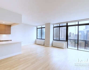W 48th St - Photo Thumbnail 0
