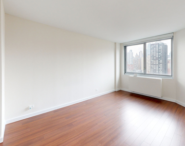 401 E 34th St - Photo Thumbnail 3