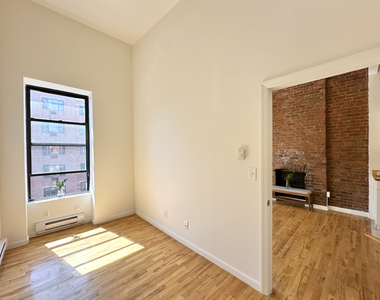 215 East 118th Street - Photo Thumbnail 1
