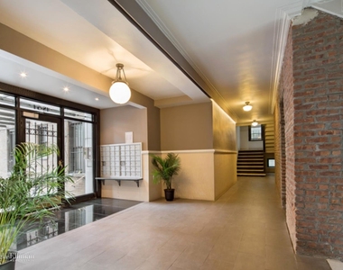 48 W 138th St - Photo Thumbnail 2