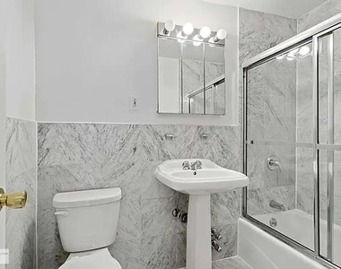 E 83rd St. - Photo Thumbnail 3