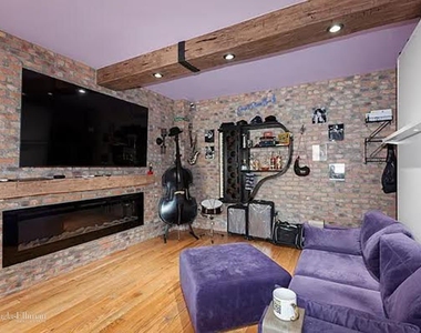339 E 58th St - Photo Thumbnail 0