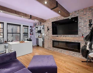 339 E 58th St - Photo Thumbnail 1