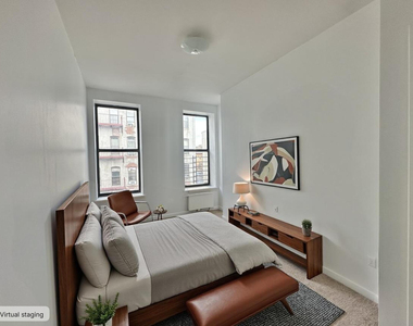 217 East 118th Street - Photo Thumbnail 3