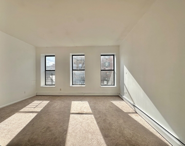 217 East 118th Street - Photo Thumbnail 1
